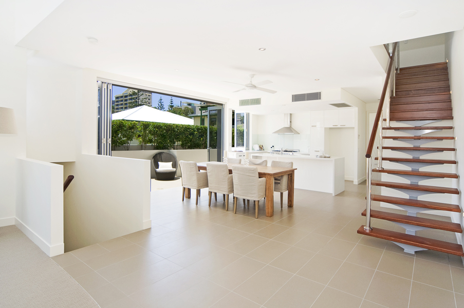 Multi-level living space with floating staircase
