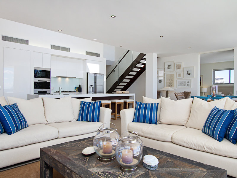 Penthouse living room with gallery wall