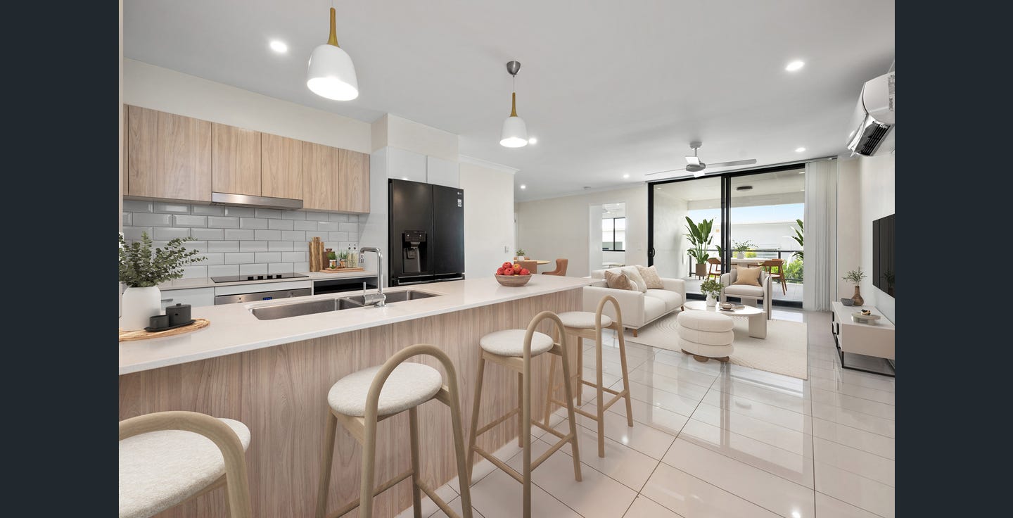 Modern kitchen and living at a Border-Realty-sold development